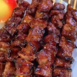 Juicy Filipino-style barbecue skewers grilled to perfection with a caramelized glaze.