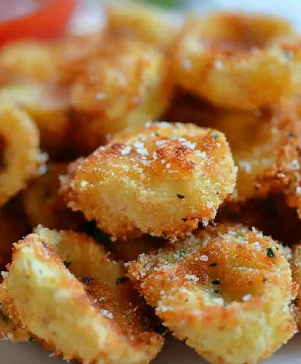 Crunchy parmesan-coated tortellini served with a side of marinara