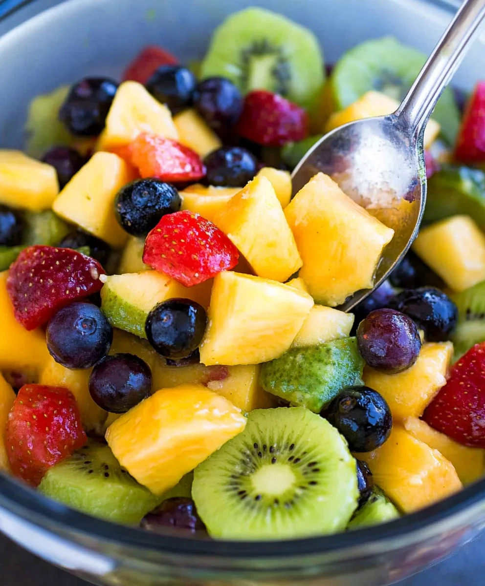 Best Fruit Salad with Honey-Lime Dressing in a bowl