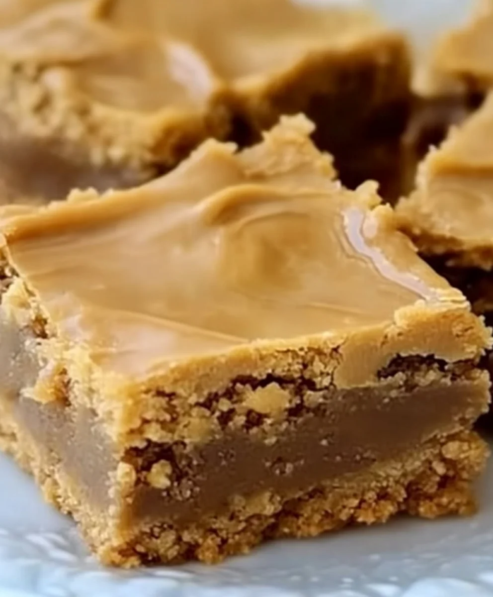 Freshly baked Peanut Butter Lunch Lady Cookie Bars with frosting
