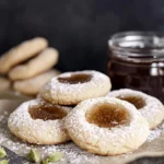 Cardamom Cookies With Fig Jam showcasing thumbprint design