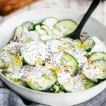 Cucumber Everything Bagel Salad with fresh herbs and onions