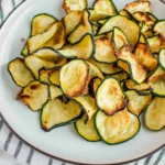 Air fryer crispy zucchini chips with garlic and seasoned salt