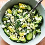Cucumber Avocado Salad with Dill and Feta in a bowl