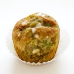 Freshly baked banana zucchini muffins with golden brown tops