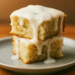 Delicious Lemon Zucchini Bars with Sweet Glaze on a Plate