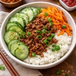 Quick & Easy Korean Ground Beef Bowl served over rice with vegetables